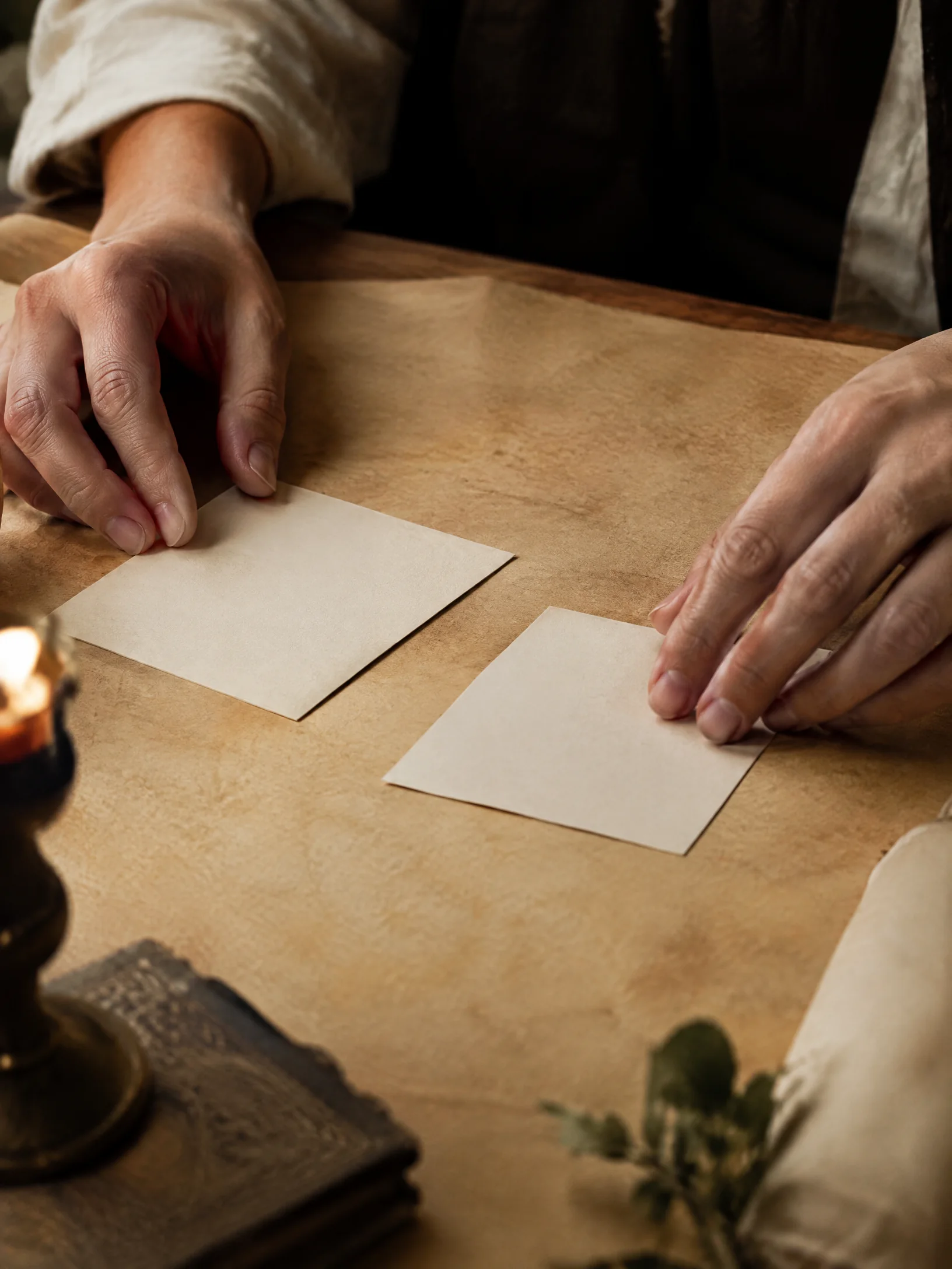 Hands arranging career cards